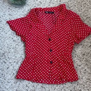 Small, fun heart blouse with a small peplum shape.